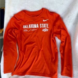 Nike Kids Long Sleeve Dry-Fit Tee in Bright Orange with Oklahoma State Logo